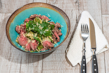 Tasty and healthy salad with roast beef