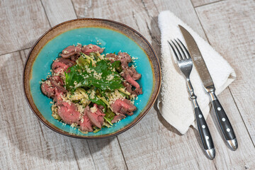 Tasty and healthy salad with roast beef