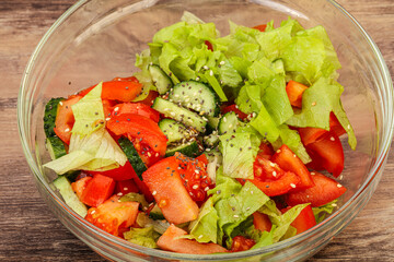 Vegan salad with tomato, cucumber and chia