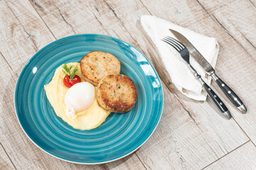 Mashed potatoes, poached egg, tomato, dill, meatballs