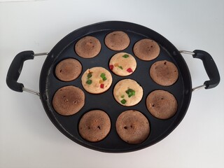 Pan cakes in pan on white background
