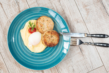 Mashed potatoes, poached egg, tomato, dill, meatballs