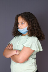 Annoyed girl waiting wearing mask