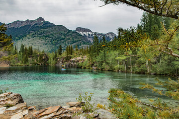 Lake surrounded by mountains and forests