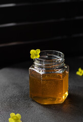 Natural homemade honey with yellow flower 