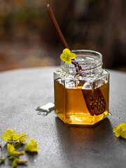 Natural homemade honey with yellow flower 