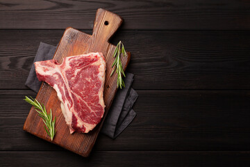 Raw T-bone beef steak