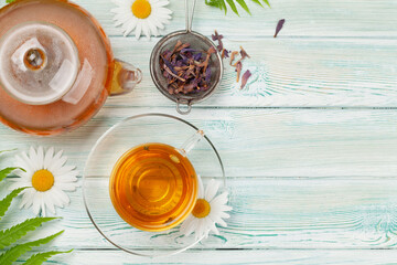 Herbal tea in teapot and cup