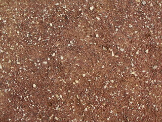 Beige stone gravel background texture. Brown small rocks abstract road pavement pattern