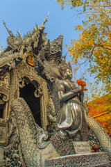 Naklejka premium Beautiful silver craved church at Wat Srisupan temple in Chiang Mai. Thailand. Wat Srisuphan also known as the Silver Temple because of its impressive hand crafted silver ordination hall decoration.