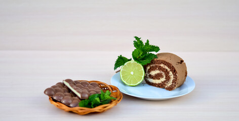 Tasty, sweet cake for breakfast, close-up. It can be served with tea with lime and mint. Food for...
