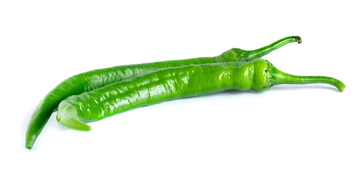 Fresh bitter green peppers isolated on white background