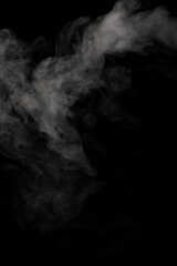 A stream of white smoke on a black background mixes randomly creating bizarre swirl patterns