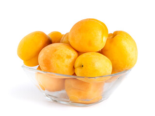 Apricots in the glass bowl isolated on white background, healthy food