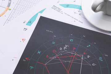 The desktop of an astrologer. The magical mysterious atmosphere of the working environment of the...