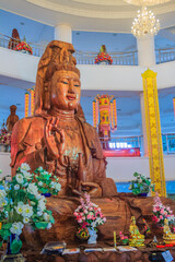 Beautiful wood statue of Guan Yin at Huay Pla Kang Temple, Chiang Rai, Thailand. Guan Yin is a female Bodhisattva in Thai Buddhism, which means someone that reached enlightenment.