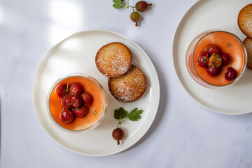 Gooseberry posset and sweet almond cakes
