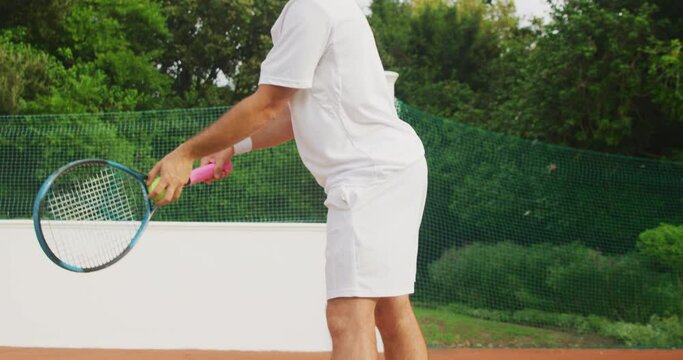 Tennis player doing a service 