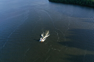 panoramic view of the river with floating boats and beautiful clouds shot from a drone