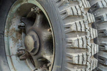 Fototapeta na wymiar wheel of a historic army truck