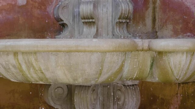 Falling water from the fountain in the Jewish quarter of Seville