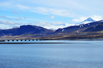 Borgarnes bridge with snowy mountains and hills