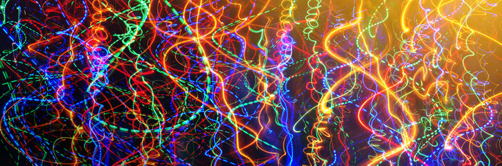 Defocused colorful abstract lights background. Motion of blur light. Nice background on the theme...