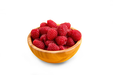 Raspberries in a wooden bowl Save with clipping path. 