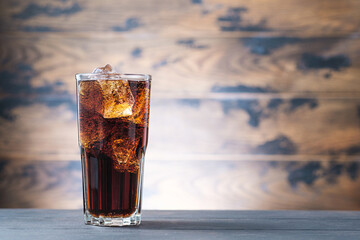 Cold fizzy drink with ice cubes