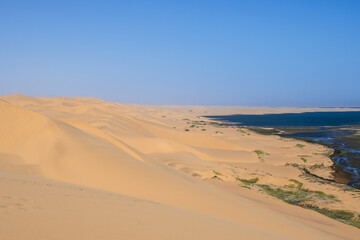 Fototapeta na wymiar Sand dunes at Sandwich Harbour, Namibia