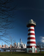 Manhattan view with lighthouse from Newport. New Jersey. USA.