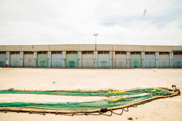 Fishermen's warehouses in the port of Aguilas, Murcia, Spain