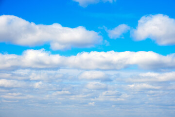 Obraz premium Large white clouds on a blue sky background