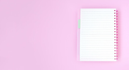 Empty notebook paper for text on pink background