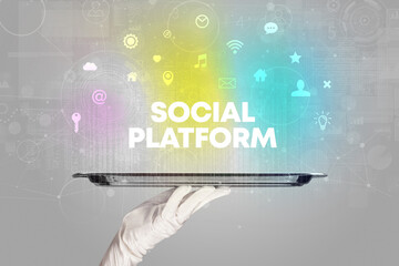 Waiter serving social networking with SOCIAL PLATFORM inscription, new media concept