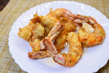 Langoustines fried in batter on a plate
