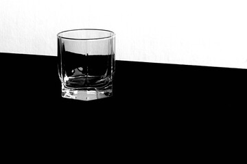 empty glass in black and white space