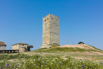 Fototapeta na wymiar Byzantine Tower in town of Nea Fokea, Chalkidiki, Greece