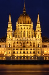 Fototapeta na wymiar Parliament building of Budapest above Danube river in Hungary at night
