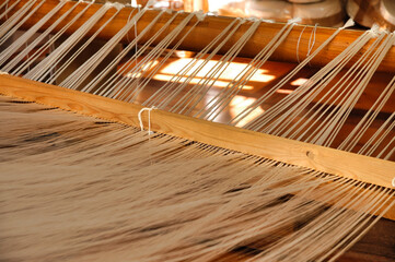 hand weaving with ancient loom
