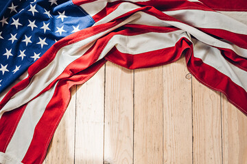 American flag on a wooden texture. 4th of July, US Independence Day and Memorial Day background