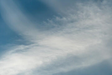 fluffy clouds on a blue background