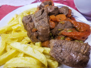 Beef stew with fried potatoes