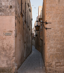 Narrow medieval alley in Mdina on Malta.