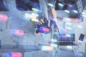 Double exposure of man and woman working together and data theme hologram drawing. Computer background. Top View.