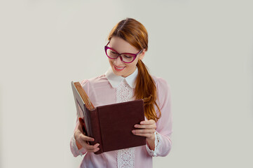 long-haired girl reading a the book, a student in isolation