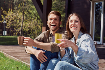 Lovely couple being excited during outdoor rest