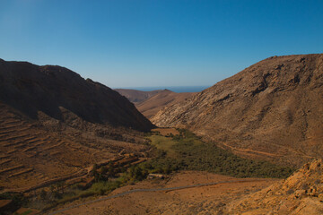 Landscape of Panoramic vulcanic mountains and Atlantic Ocean ,  dunes of coralejo and Gran Tarajal Port in Fuerteventura, Lanzarote 