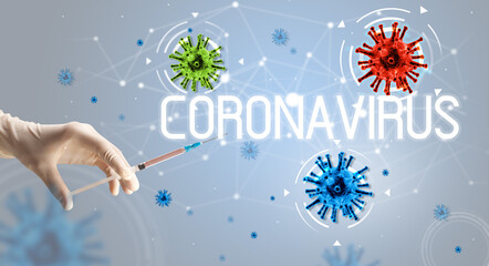 Syringe, medical injection in hand with CORONAVIRUS inscription, coronavirus vaccine concept