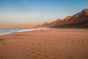 Landscape of Panoramic vulcanic mountains and Atlantic Ocean ,  dunes of coralejo and Gran Tarajal Port in Fuerteventura, Lanzarote 